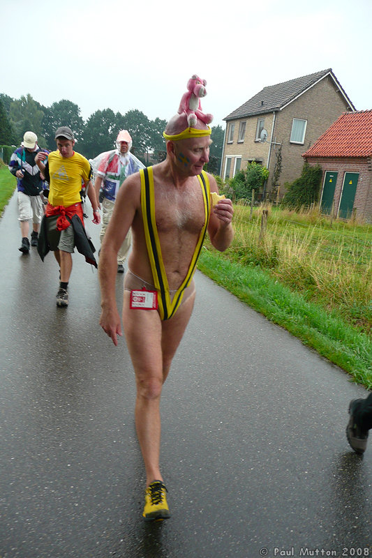 P1000714 Walking Nijmegen in the rain in a mankini